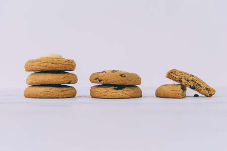 Oatmeal cookies with chocolate on a light backgroundの写真素材