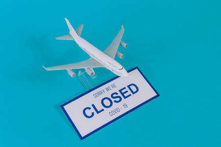 Blue plate Sorry We're Closed COVID-19 with airplane