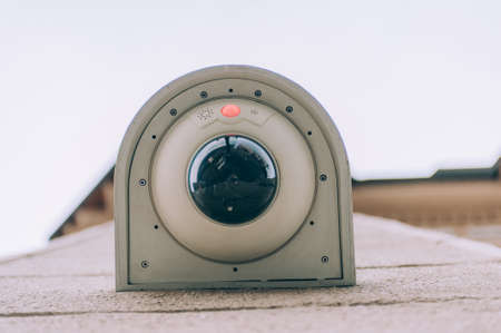 City web camera for surveillance on the background of the building and the skyの写真素材
