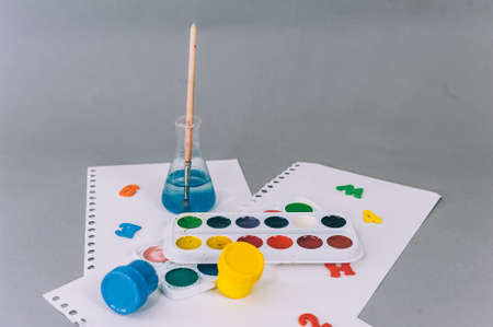 Back To School Concept. Paints for painting on a gray backgroundの写真素材