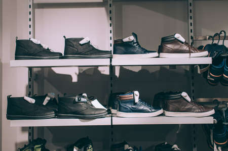 Modern Shoes on a showcase in a supermarketの写真素材