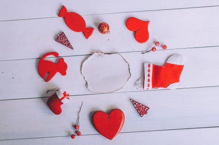 Burnt paper mockup with holiday decoration for the new year on a wooden backgroundの写真素材