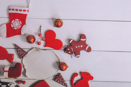 Burnt paper mockup with holiday decoration for the new year on a wooden backgroundの写真素材