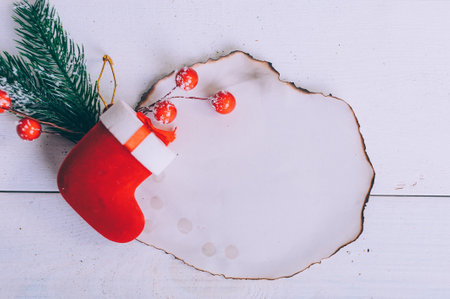 Festive composition for new year and christmas. Christmas tree with decoration on a wooden tableの写真素材
