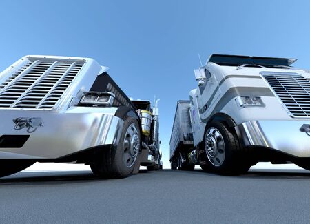 The image of two trucks against the skyの写真素材