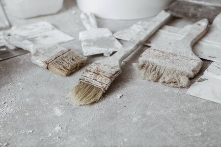 Plastering tools on cement background. Close-up view.の写真素材