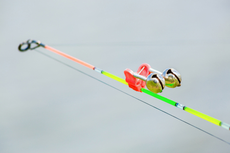 Bell on the fishing rod closeup. Equipment for fishing.の写真素材
