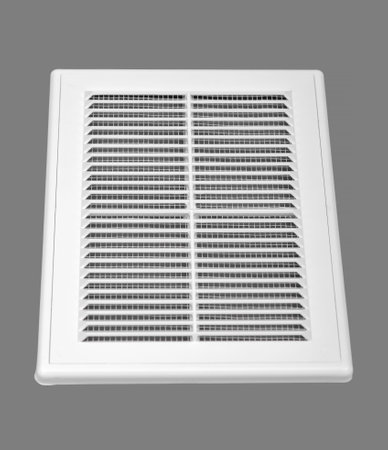 White ventilation grate on a gray background. Rectangular shape, plastic material.の写真素材