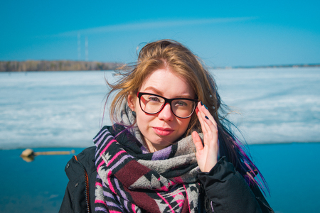 portrait of a young woman in glassesの写真素材