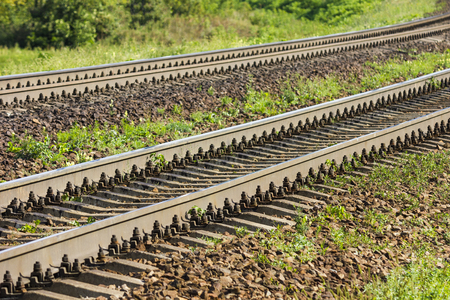Two Railways oncoming direction in the suburbs. Parallel straight pathsの写真素材