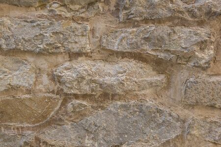 The texture of the walls made of stones bonded with cement.の写真素材