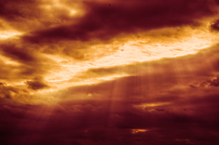 red sunset Fantasy sky, thick clouds before the rain.の写真素材