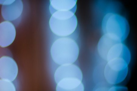 Christmas background. Festive abstract background with bokeh defocused lights.の写真素材