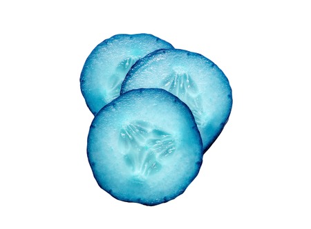 Blue slice cucumber isolated on white background.の写真素材