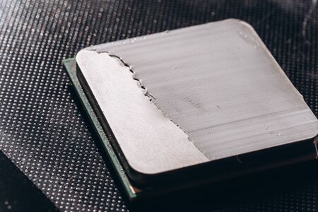 The processor of the computer with the thermal paste applied on it. Details of the computer's system unit.の写真素材
