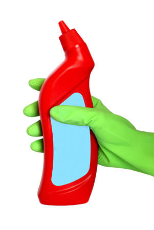 Hand with glove hold the bottle. Cleaning equipment for houseworkの写真素材