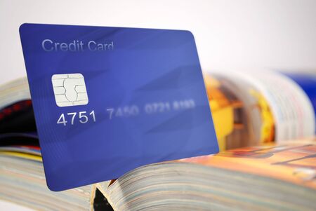 credit card and catalog for shoppingの写真素材