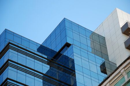 Office building and blue skyの写真素材