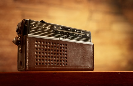 retro radio on grunge blurred wall backgroundの写真素材