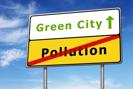green city road sign concept image on blue sky backgroundの写真素材