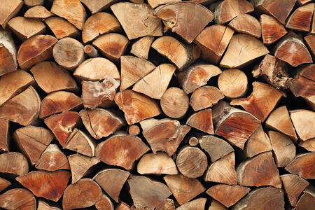 pile of stacked wood logs as natural background