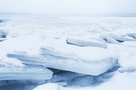 ice on river closeup of big blocks, selective focusの写真素材