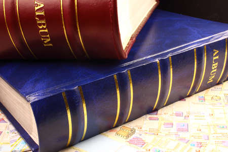 Two photo albums on city map の写真素材