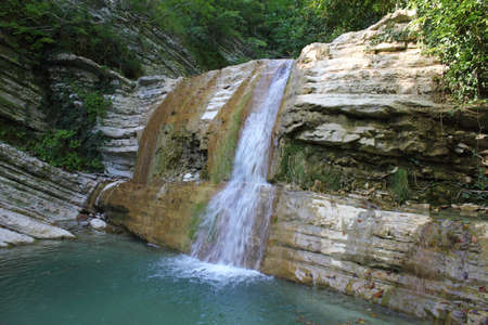 Waterfall on the mountain river の写真素材