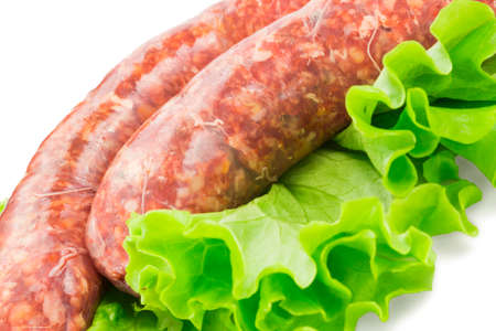 Beef sausage with greensの写真素材
