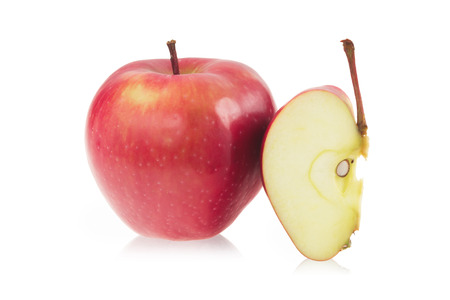 Red apple and a slice of red appleの写真素材