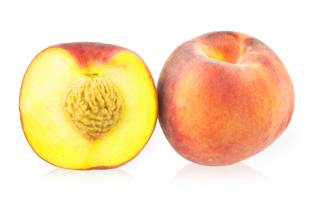 One whole peach and one half peachの写真素材
