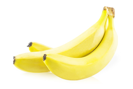 Three bananas in a bunchの写真素材