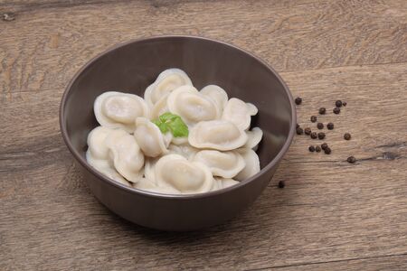 traditional Russian dumplings with sour creamの写真素材