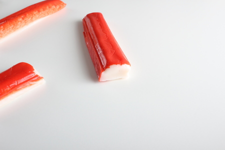 crab sticks on a white backgroundの写真素材