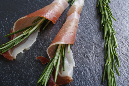 prosciutto, jamon on a stone backgroundの写真素材