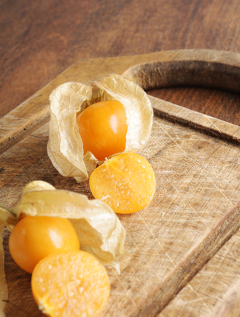 physalis on a wooden backgroundの写真素材