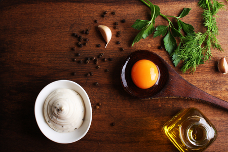 mayonnaise sour cream sauce on a wooden background cookingの写真素材