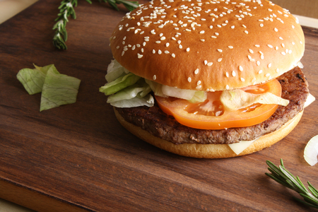 burger on a wooden backgroundの写真素材