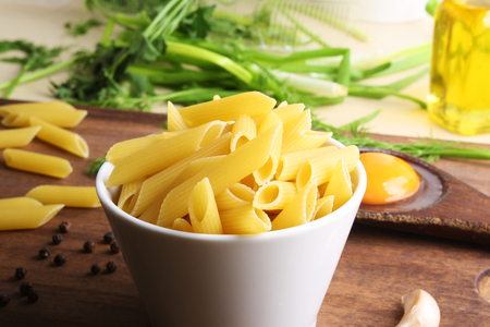 Penne rigate. Macaroni in the form of feathers mostaccioli pastaの写真素材