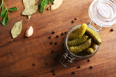 cucumber cornichons cuke on a wooden background cookingの写真素材