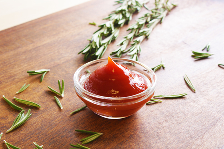 ketchup, tomato sauce in a glass bowlの写真素材