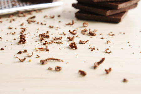 chocolate slices and graterの写真素材