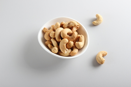 cashew nuts on gray backgroundの写真素材