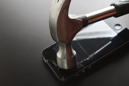phone broken screen hammerの写真素材