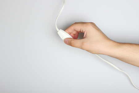 switch and wire in handの写真素材