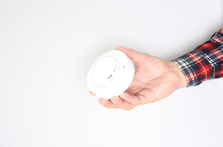 fire alarm sensor in handの写真素材