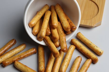 breadsticks glassware gray background