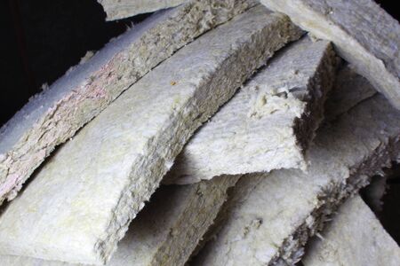stone wool knife rock cut insulation rockwool isolationの写真素材