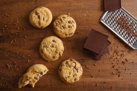 cookies with chocolate on a wooden backgroundの写真素材