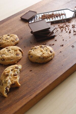 cookies with chocolate on a wooden backgroundの写真素材